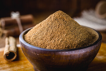 ground cinnamon and ground cinnamon, with a spot focus.