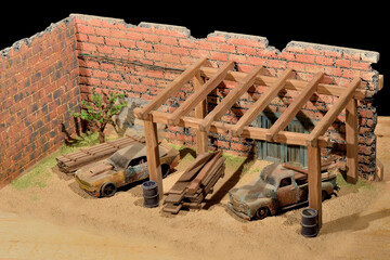Fototapeta na wymiar diorama coche, maquetas de coches viejos en un patio viejo 