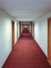 The long white corridor in the hotel