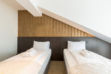 Fototapeta na wymiar Interior of a hotel multi bed bedroom