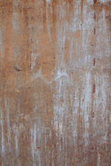 Old rusted metal texture. The surface of an uneven iron wall. Perfect for background and grunge design.