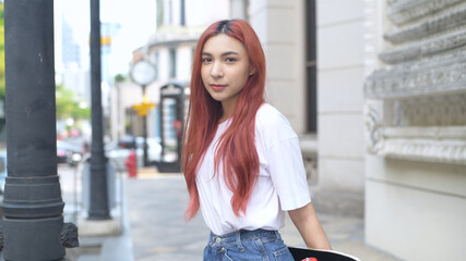 Independent concept. Indie women are waiting for cars on the roadside. 4k Resolution.