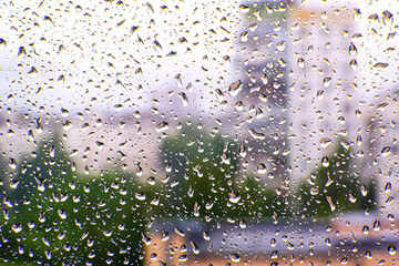 Raindrops on the glass. Water drops background.