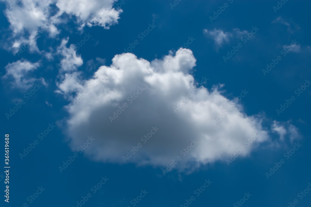 Wall mural clouds in blue sky background with copy space
