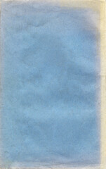 Old blue paper texture. Rough faded surface. Blank retro page. Empty place for text. Perfect for background and vintage style design.