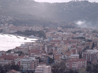 Cervo Ligure, Italy - 06/15/2020: Travelling around the Riviera Ligure in summer days. Beautiful photography of the small vilagges near the sea with typical old buildings.