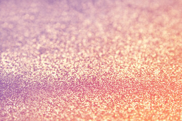 Pink Gold glitter texture sparkling paper background. Abstract twinkled glittering background  with bokeh, defocused lights for Christmas holiday, banner, wedding invitation and greeting cards.