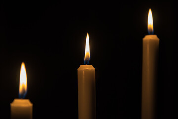 Three candles light