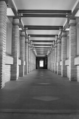 Black and white photo of an outdoor walkway