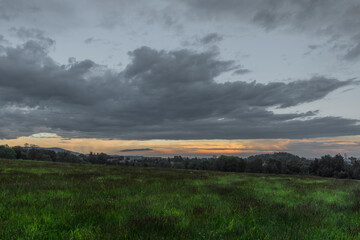 Sunset in hot summer rainy evening near Roprachtice village