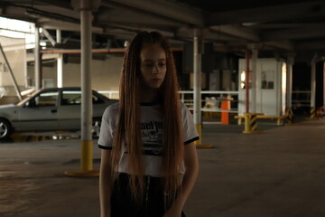 Obraz premium girl in the parking lot