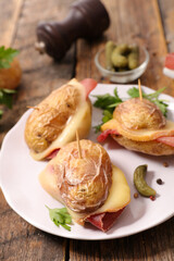 potato with melted cheese and bacon