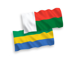 Flags of Gabon and Madagascar on a white background
