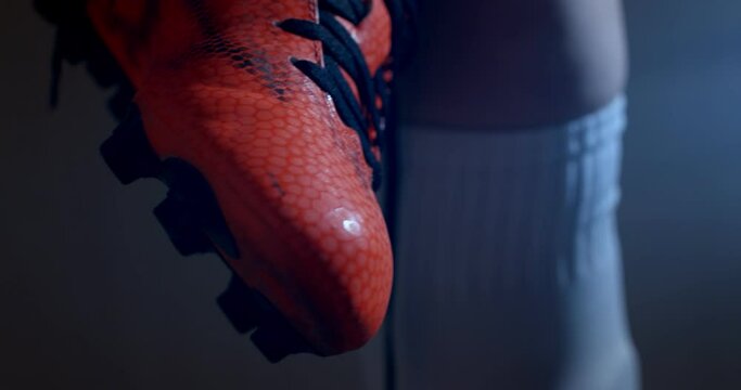 Female soccer football. Professional soccer football woman player put on her shoes. 4k Slow Motion