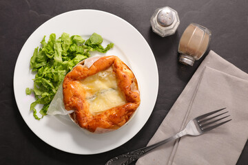 baked camembert, morbier with lettuce- top view