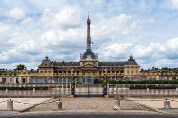 The Military School (Ecole Militaire) backyard entrance with the Eiffel tower in the background - Paris, France.