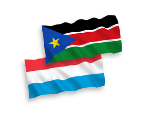 Flags of Republic of South Sudan and Luxembourg on a white background