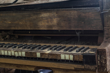 Fototapeta na wymiar old dusty piano detail view