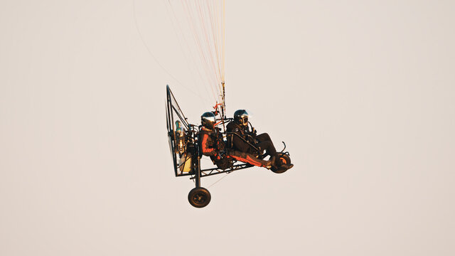 Paramotor Tandem Gliding And Flying In The Air. Copy space. High quality photo