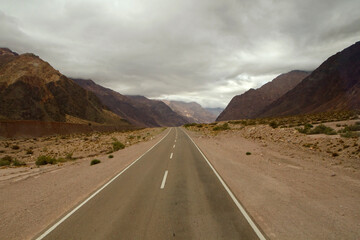 Traveling along the asphalt highway in the mountains on the road to mount Aconcagua.