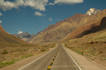 Desert road. Traveling along the asphalt route 40 across the arid and rocky mountains.
