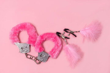 on a pink background sex product, toy for adults