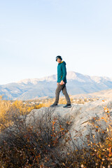 Listening to music on a hike in the mountains