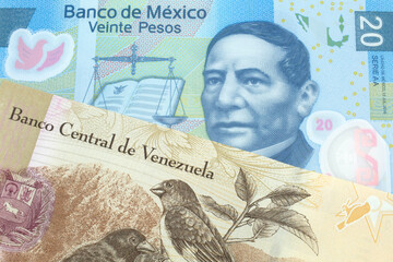 A one hundred Bolivar note from Venezuela with a twenty peso note from Mexico close up in macro
