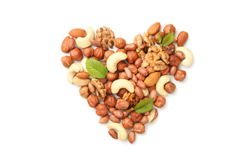 Heart made of different nuts isolated on white background