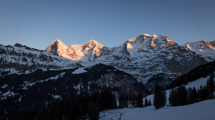 Eiger, Mönch und Jungfrau im Abendrot, Schweiz