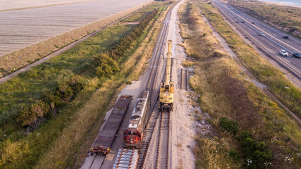 Fototapeta na wymiar Rail tracks maintenance process. Repairing railway. 