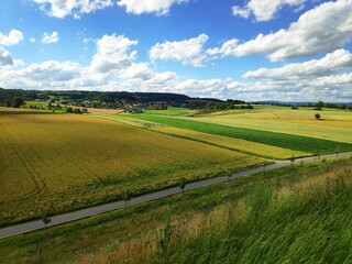 A dramatic afternoon sky in Franconia, Germany on a beautiful July day.