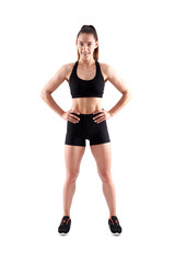 Young female fitness model on white
