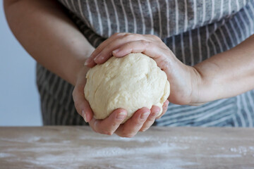 yeast dough and human arms