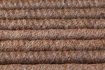 Tasty wafer roll sticks as background, top view. Crispy food. Close-up. Full depth of field.
