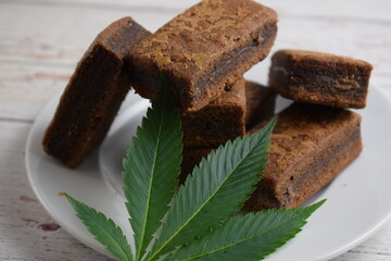 Brownies and cannabis leaf.