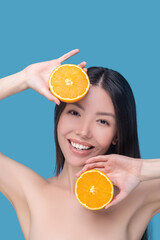 Woman using citrus acids for cosmetological procedures