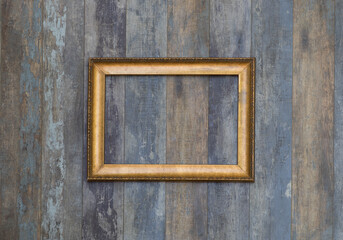 antique museum golden frame on old wooden wall