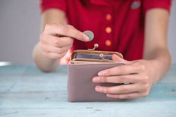 woman hand coin and wallet