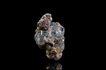 macro stone mineral aquamarine on a black background