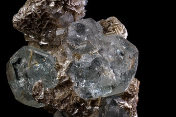 macro stone mineral aquamarine on a black background