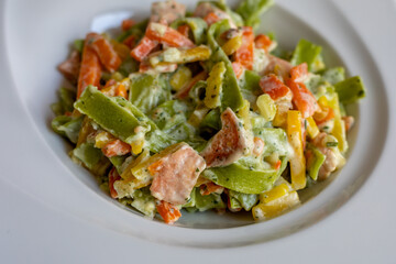 Salmon and Spinach Fettuccine pasta on white dish