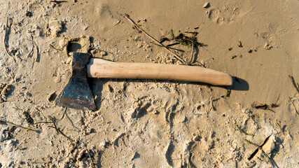 the ax on the sand