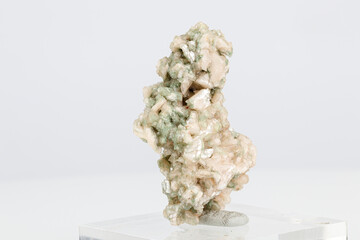 macro stone mineral stilbite on Apophyllite on a white background