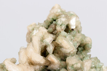 macro stone mineral stilbite on Apophyllite on a white background