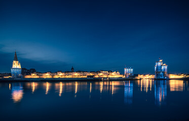 Fototapeta na wymiar Panoramic view of the old harbor of La Rochelle at blue hour with its famous old towers