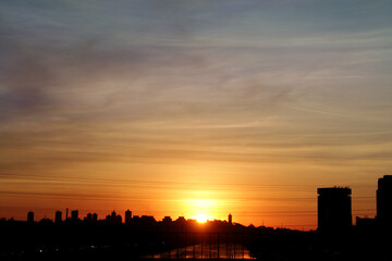 Fototapeta na wymiar City skyline with sunset in the background