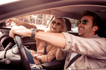 Couple enjoying road trip together.