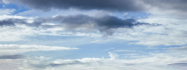 Clouds in the overcast sky view. Climate, environment and weather concept sky background.