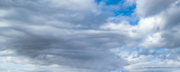 Clouds in the overcast sky view. Climate, environment and weather concept sky background. - obrazy, fototapety, plakaty